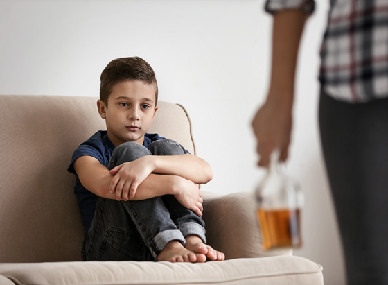 Alcoholic father next to concerned son