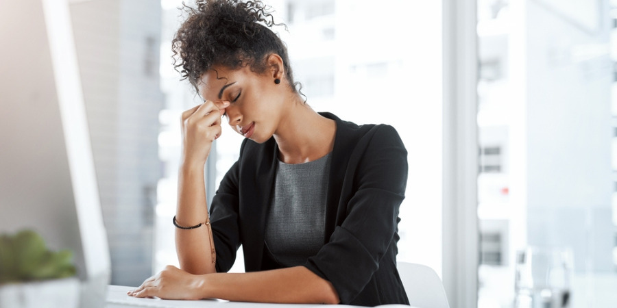 Depressed woman in office