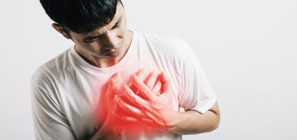 Young man suffring chest pain