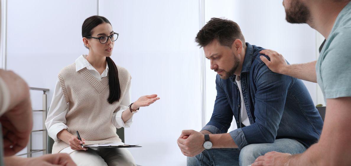 Drug addicted man in group therapy