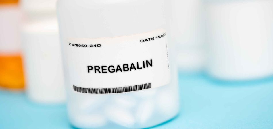 Pregabalin pill in container