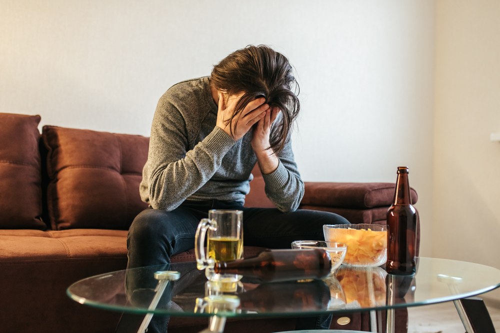 alcoholic daughter sitting on table
