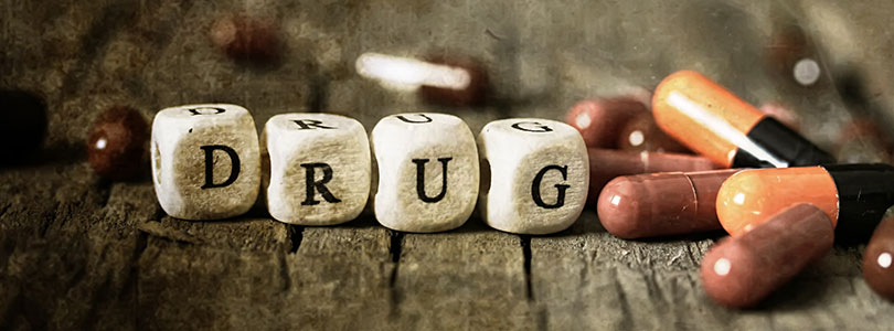 Image of cubes showing the word drug