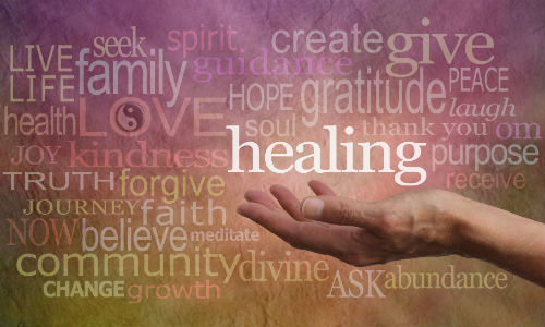 a photo of a hand and words symbolising addiction therapies