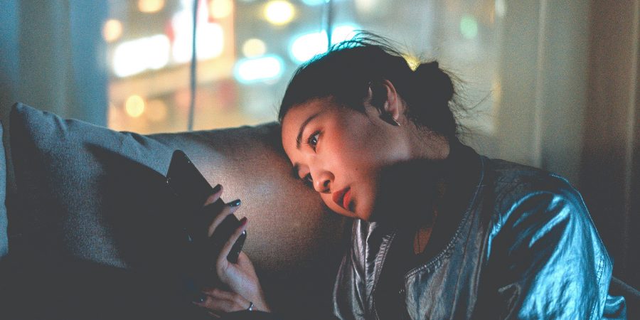 woman texting on phone