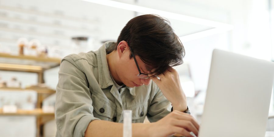 Halcion-Addiction-Man-With-Headache