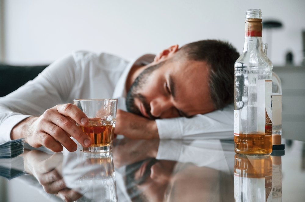 man sleeping after drinking