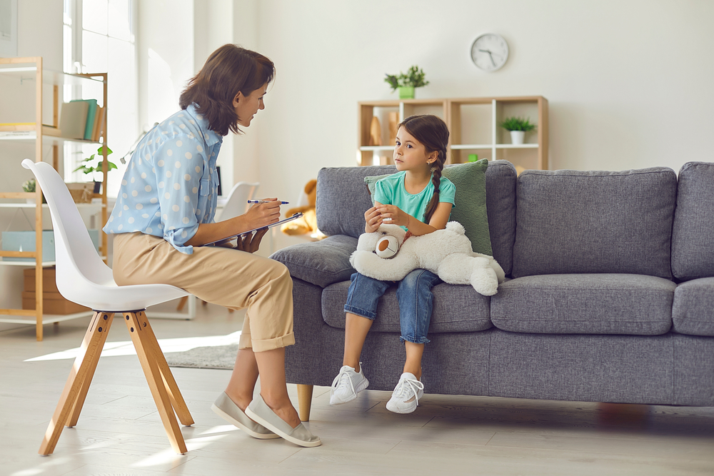 Young lady give mental support to child