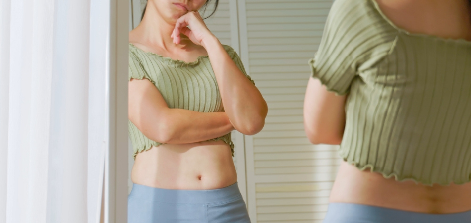 Frustrated woman in the mirror