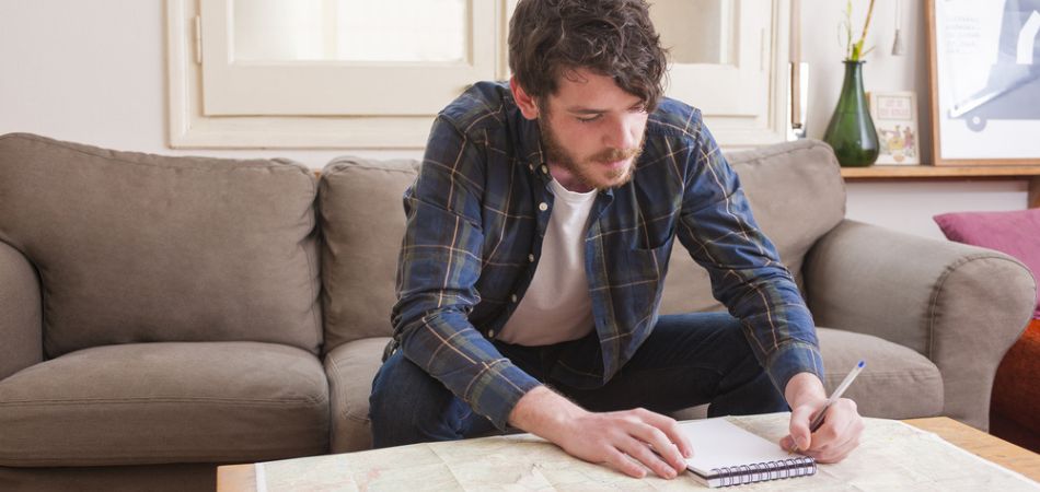Man writing as a plan for coping strategies