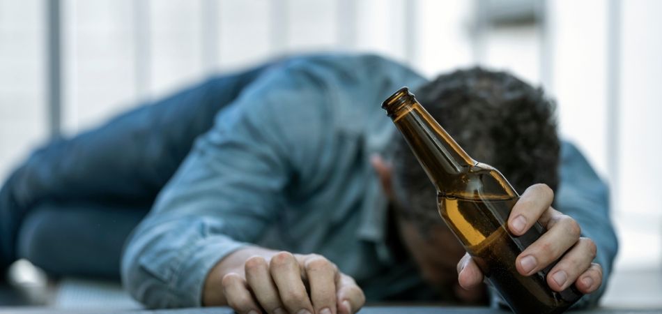 alcoholic man with bottle