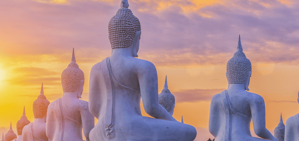 Buddha statue sunset